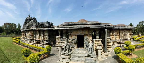 Old temple against cloudy sky