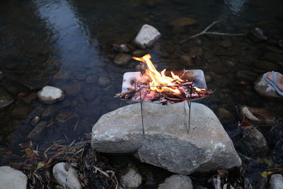 High angle view of fire in water