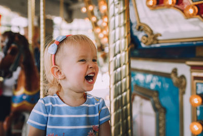 Close-up of girl in amusement park