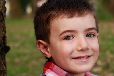 Close-up portrait of smiling boy