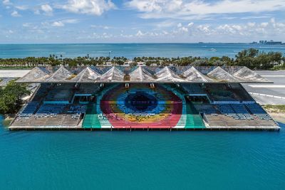 High angle view of swimming pool by sea against sky