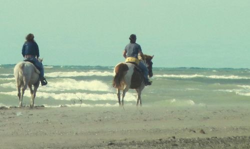 Silhouette of woman on beach