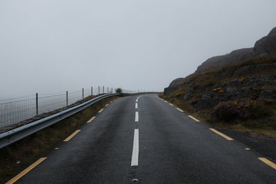 Road against clear sky