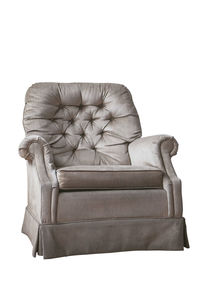 Close-up of sofa against white background