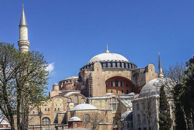 Low angle view of cathedral against blue sky