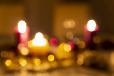 Defocused image of illuminated lights at night