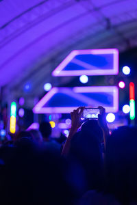 People enjoying at music concert