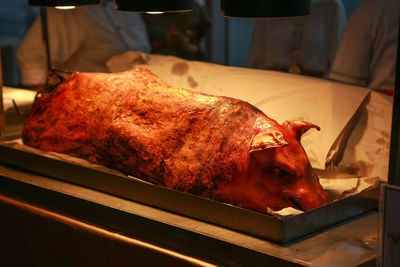 Close-up of pork in commercial kitchen