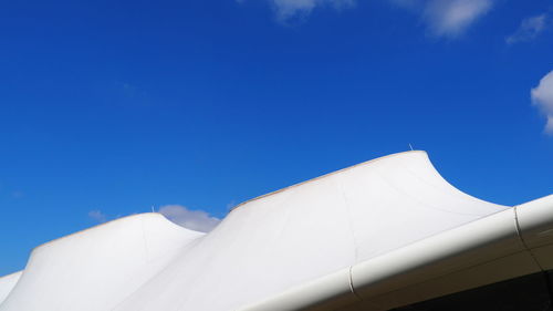 Low angle view of building against blue sky