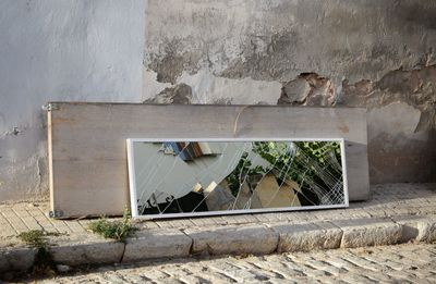 Broken window of old building