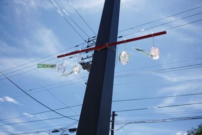 Wind chimes on a electric post