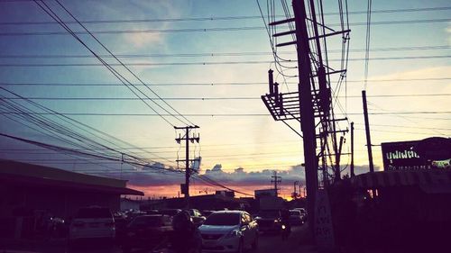 Electricity pylons at sunset