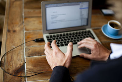 High angle view of man working on table