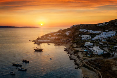 High angle view of sea against sky during sunset