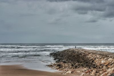 Scenic view of beach against sky