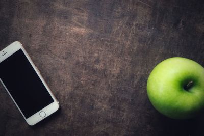 High angle view of apple on table