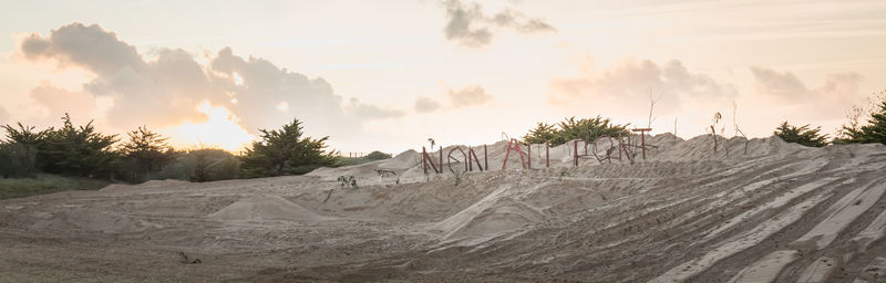 Panoramic view of land against sky during sunset