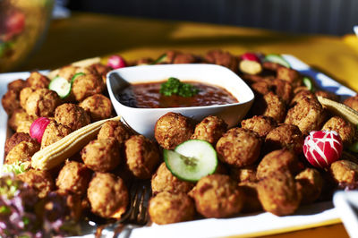 Close-up of food served on table