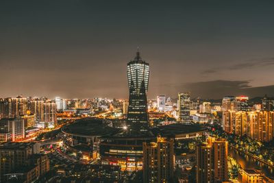 Illuminated buildings in city at night