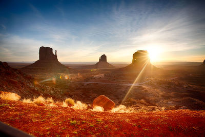 Scenic view of landscape against sky during sunset