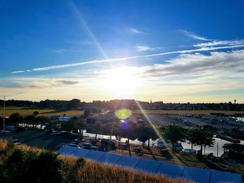 Scenic view of swimming pool against sky during sunset