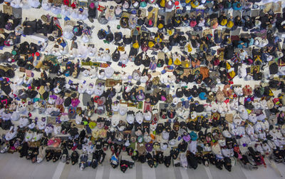 High angle view of people walking on street