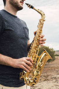 Low angle view of man playing guitar