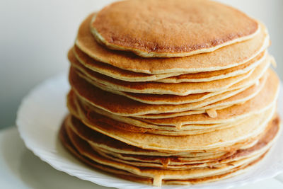 Close-up of bread in plate on table