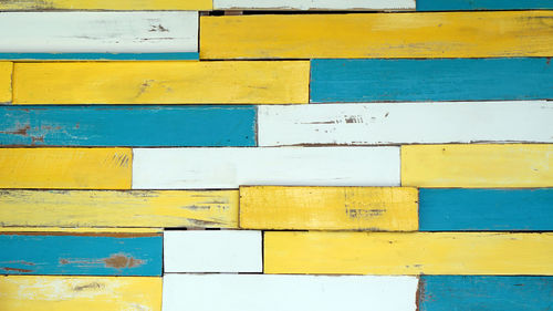 Colors painted wood plank yellow and blue wall bright summer 