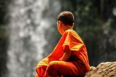 Rear view of a man in temple