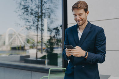 Young man using mobile phone