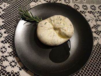 High angle view of fruit in plate on table