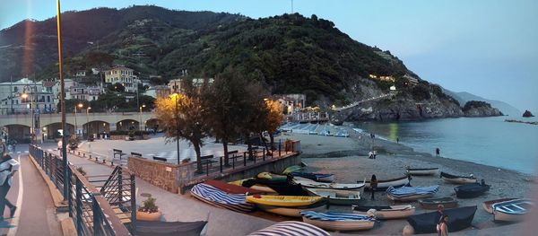 Panoramic view of boats moored in sea