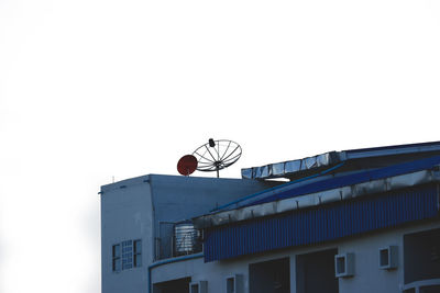 Low angle view of buildings against clear sky