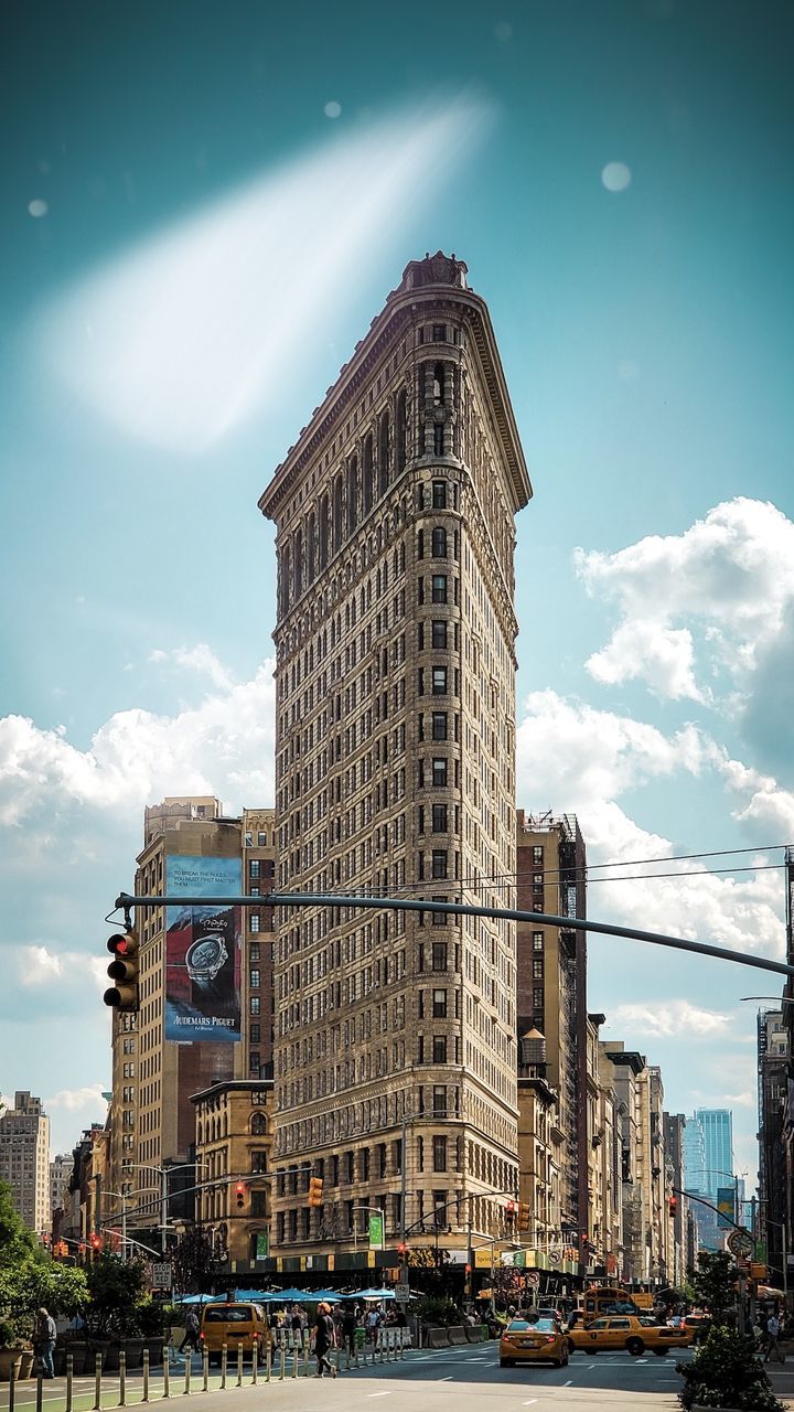 architecture, built structure, building exterior, sky, city, cloud - sky, building, mode of transportation, transportation, tower, tall - high, nature, day, travel destinations, low angle view, no people, motor vehicle, travel, outdoors, office building exterior, skyscraper