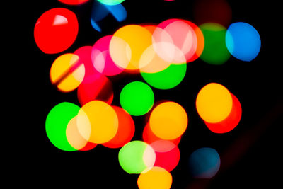 Defocused image of illuminated lights at night