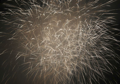 Full frame shot of firework display at night