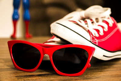 Close-up of sunglasses on table