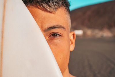 Close-up portrait of young man