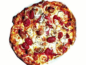 Close-up of fruit over white background