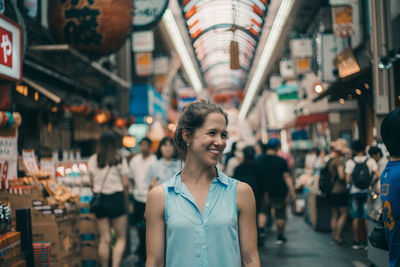 Young woman standing outdoors