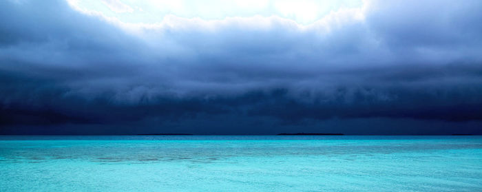 Scenic view of dramatic sky over sea