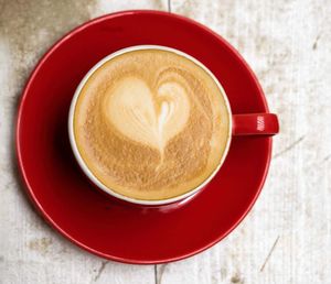 High angle view of cappuccino on table