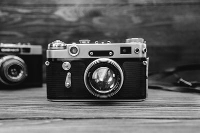 Close-up of vintage camera on table 