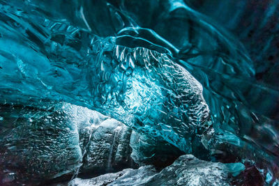 The wonderful colors of blue ice in the ice caves of vatnajokull, europe's largest glacier