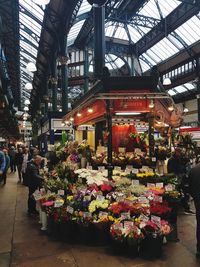 Group of people at market stall