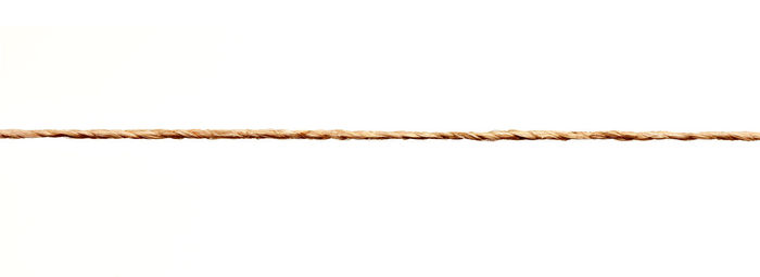 Close-up of rope against white background