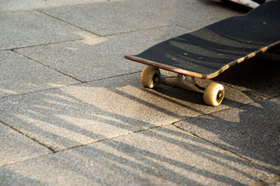 High angle view of skateboard on street