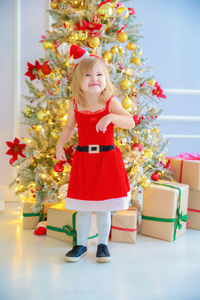 Portrait of girl with christmas tree