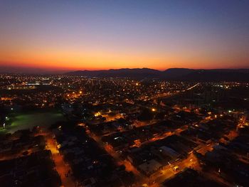 Aerial view of cityscape at night